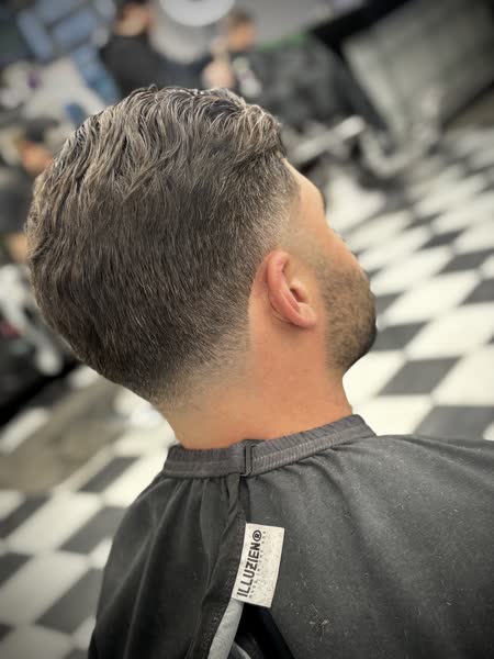 Textured crop with a clean neck taper at Salt City Barber Shop in Liverpool, NY
